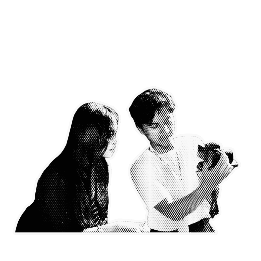 Two people looking at a camera together