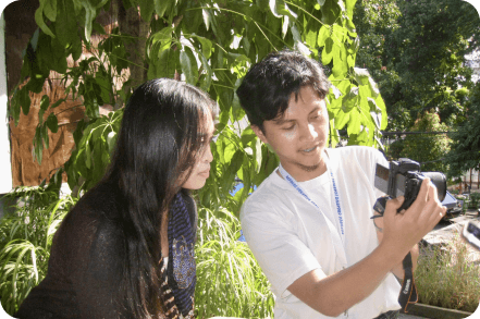 Participants practicing photography outdoors