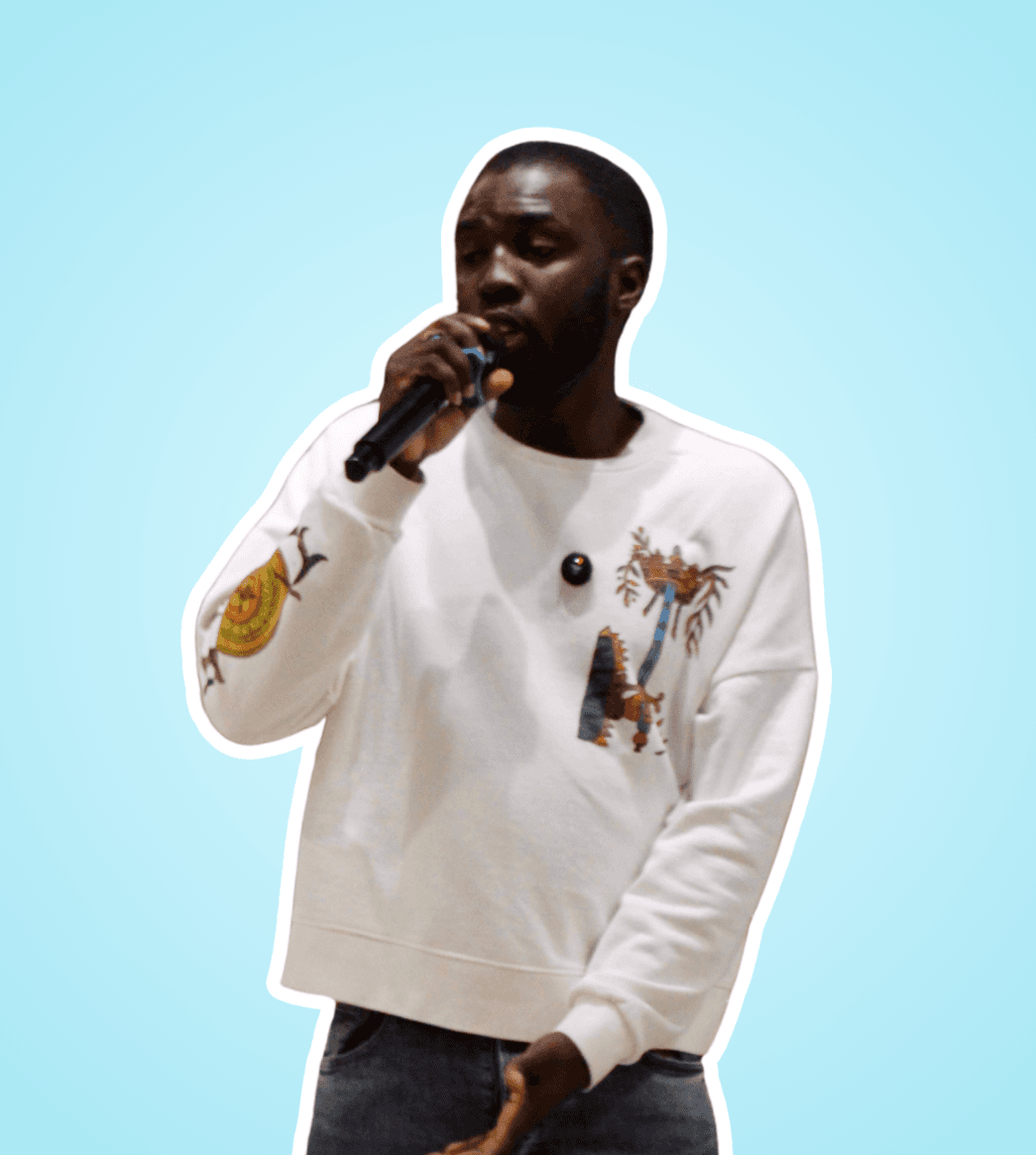 Young man speaking into a microphone