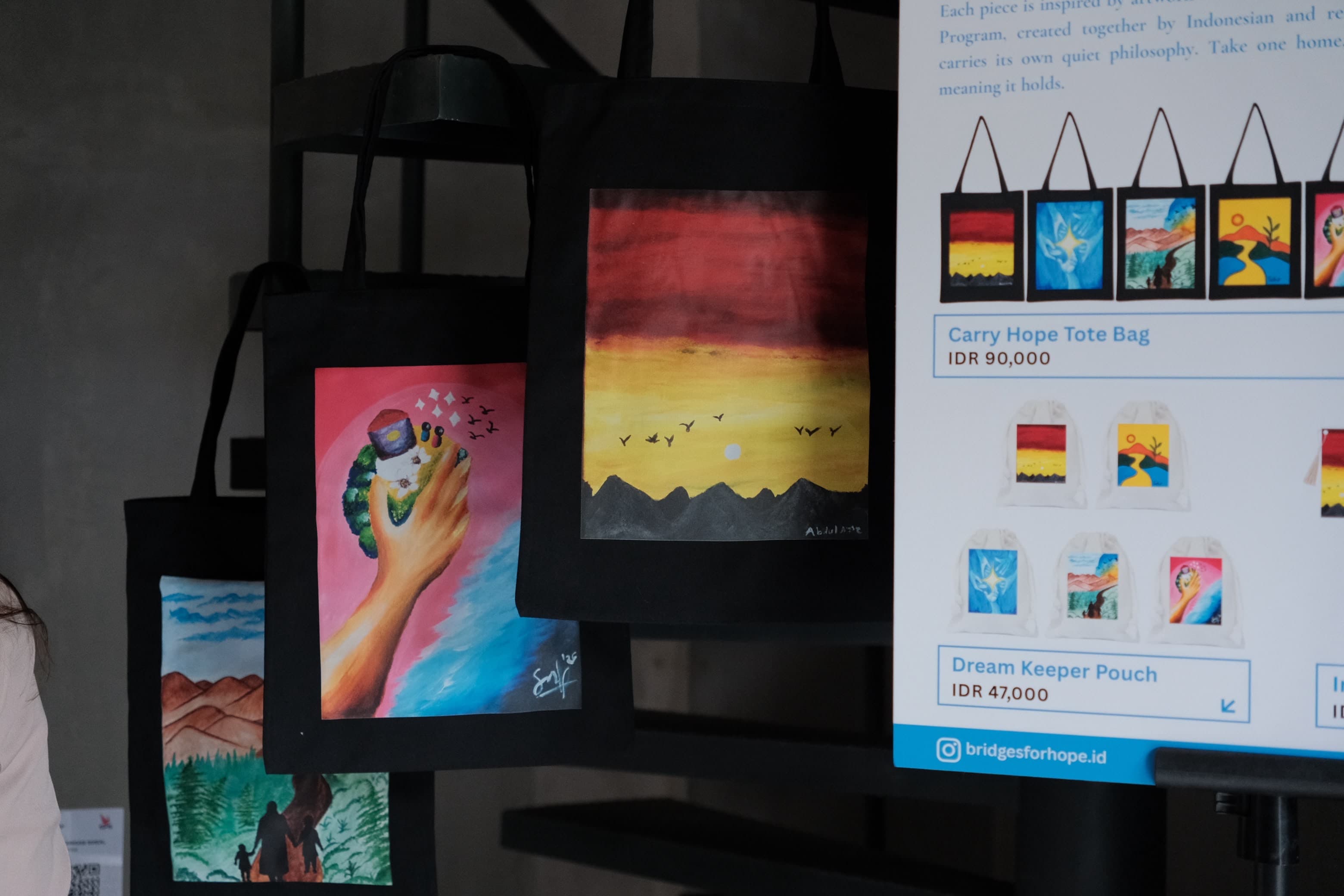 Handbuilt Hope products displayed at a community booth